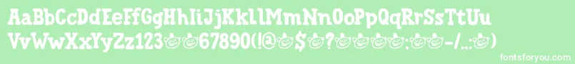 フォントDkTrainedMonkey – 緑の背景に白い文字