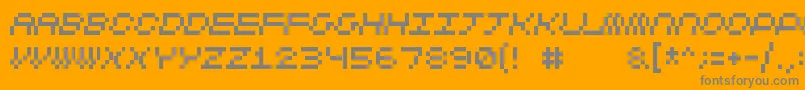 Cubicfive11-Schriftart – Graue Schriften auf orangefarbenem Hintergrund