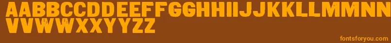 Lisätietoja Qxi-fontista Qxi-fontti – oranssit fontit ruskealla taustalla