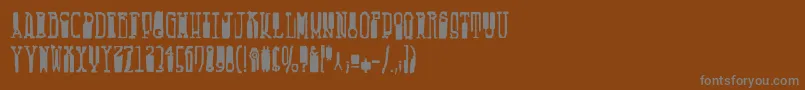 フォントFucsimile – 茶色の背景に灰色の文字