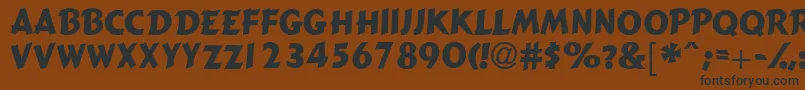 Gizmocapsssk Font – Black Fonts on Brown Background