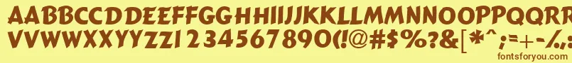 フォントGizmocapsssk – 茶色の文字が黄色の背景にあります。