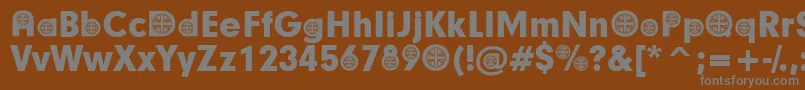 BritishParticipants-fontti – harmaat kirjasimet ruskealla taustalla