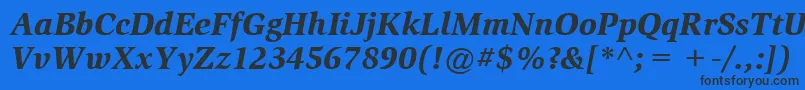 Czcionka ItcSlimbachLtBlackItalic – czarne czcionki na niebieskim tle