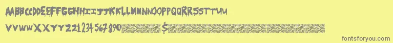 フォントScarecamp – 黄色の背景に灰色の文字
