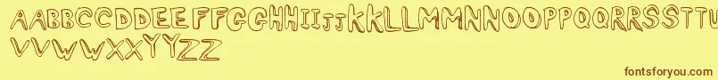 Fonte Ashy – fontes marrons em um fundo amarelo
