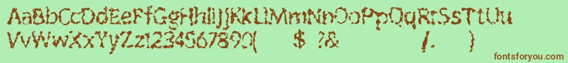 Outofink Font – Brown Fonts on Green Background