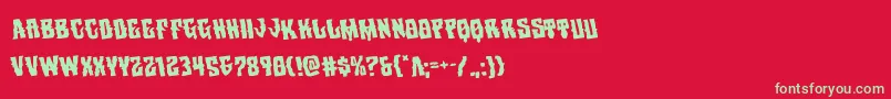 フォントWarlocksalerotate – 赤い背景に緑の文字