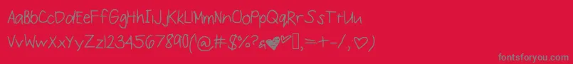 Lovestruck-Schriftart – Graue Schriften auf rotem Hintergrund