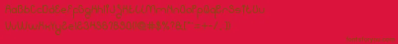 KissingTheRain-fontti – ruskeat fontit punaisella taustalla
