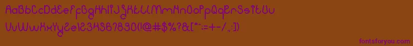 Шрифт KissingTheRain – фиолетовые шрифты на коричневом фоне