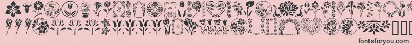 Fonte GeFloralStencils – fontes pretas em um fundo rosa