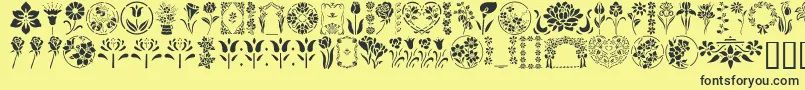 GeFloralStencils-Schriftart – Schwarze Schriften auf gelbem Hintergrund