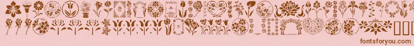 フォントGeFloralStencils – ピンクの背景に茶色のフォント