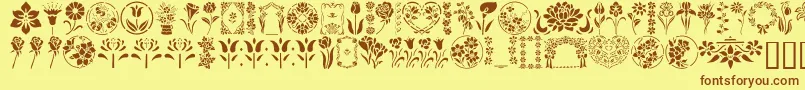 Шрифт GeFloralStencils – коричневые шрифты на жёлтом фоне