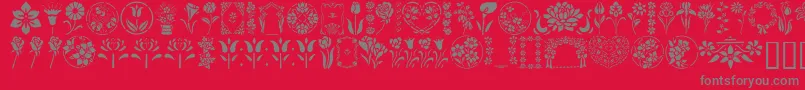 GeFloralStencils-Schriftart – Graue Schriften auf rotem Hintergrund