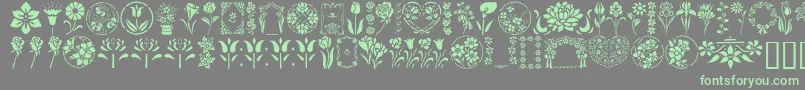 Saiba mais sobre a fonte GeFloralStencils Fonte GeFloralStencils – fontes verdes em um fundo cinza