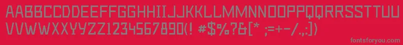 フォントDeadmetroc – 赤い背景に灰色の文字