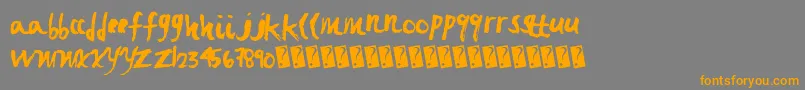 Fastbrush Font – Orange Fonts on Gray Background