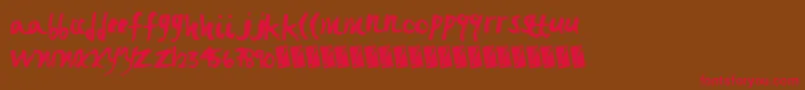 フォントFastbrush – 赤い文字が茶色の背景にあります。