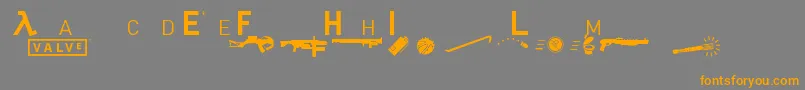 フォントHeadhumper – オレンジの文字は灰色の背景にあります。