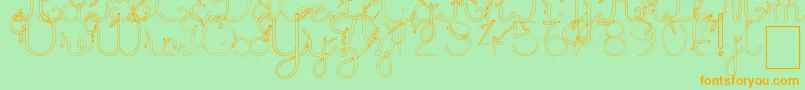 MaternellecolorCreuse-Schriftart – Orangefarbene Schriften auf grünem Hintergrund