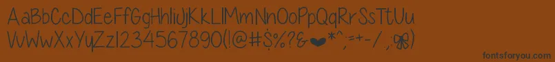Weitere Informationen zur DiamondGirlSkinny-Schriftart DiamondGirlSkinny-Schriftart – Schwarze Schriften auf braunem Hintergrund