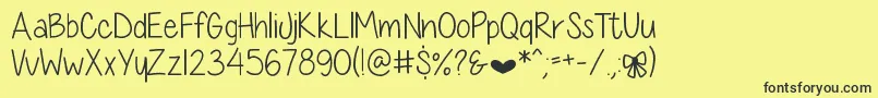 DiamondGirlSkinny Font – Black Fonts on Yellow Background
