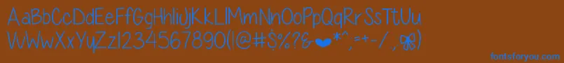 DiamondGirlSkinny Font – Blue Fonts on Brown Background