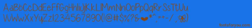 DiamondGirlSkinny Font – Brown Fonts on Blue Background