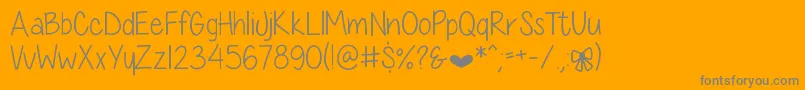 DiamondGirlSkinny Font – Gray Fonts on Orange Background