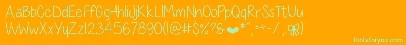 Fonte DiamondGirlSkinny – fontes verdes em um fundo laranja