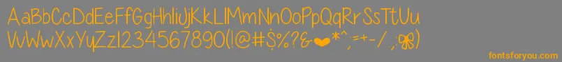 DiamondGirlSkinny Font – Orange Fonts on Gray Background
