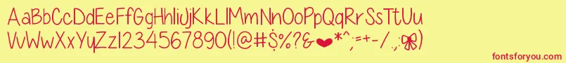 DiamondGirlSkinny-Schriftart – Rote Schriften auf gelbem Hintergrund