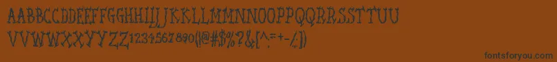 フォントSeaweedFireAoe – 黒い文字が茶色の背景にあります