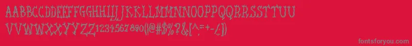 SeaweedFireAoe-Schriftart – Graue Schriften auf rotem Hintergrund