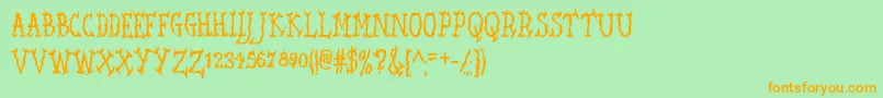 フォントSeaweedFireAoe – オレンジの文字が緑の背景にあります。