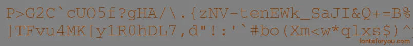 フォントSecretcode – 茶色の文字が灰色の背景にあります。