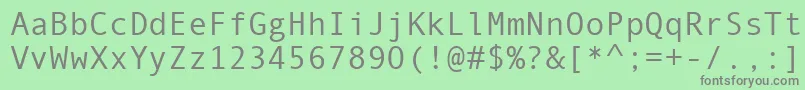 Czcionka Monotype.Com – szare czcionki na zielonym tle