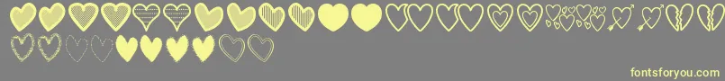 HeartsSt Font – Yellow Fonts on Gray Background