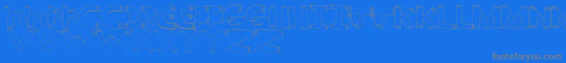 Pointy-Schriftart – Graue Schriften auf blauem Hintergrund