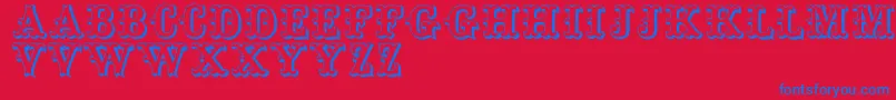 Toskanischeegyptienneinitialen Font – Blue Fonts on Red Background