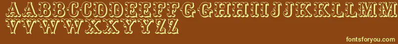 Toskanischeegyptienneinitialen Font – Yellow Fonts on Brown Background