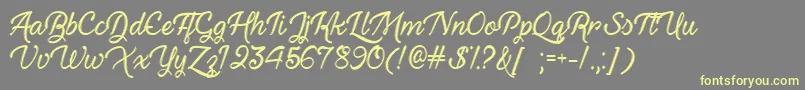 HauntedEyesOtf Font – Yellow Fonts on Gray Background