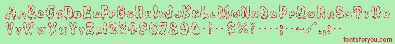 GhoulycapsRegular-Schriftart – Rote Schriften auf grünem Hintergrund