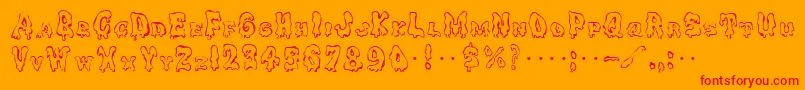 GhoulycapsRegular Font – Red Fonts on Orange Background