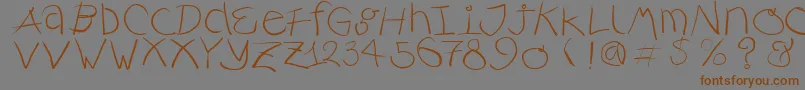 Rusticalligraphia Font – Brown Fonts on Gray Background