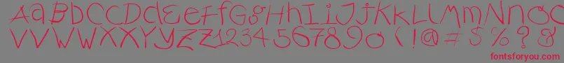フォントRusticalligraphia – 赤い文字の灰色の背景