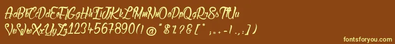 LadyBohemia2-fontti – keltaiset fontit ruskealla taustalla