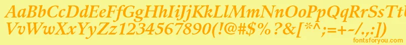 フォントGuardiltstdBolditalic – オレンジの文字が黄色の背景にあります。